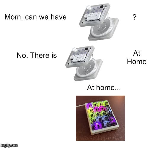 mom can we have the codex micro? no, there is codex micro at home. at home... a white numpad glowing violet, pink and lime on a leather desk mat.