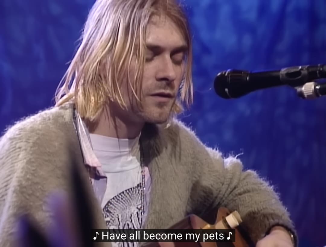 kurt cobain playing something in the way at mtv unplugged