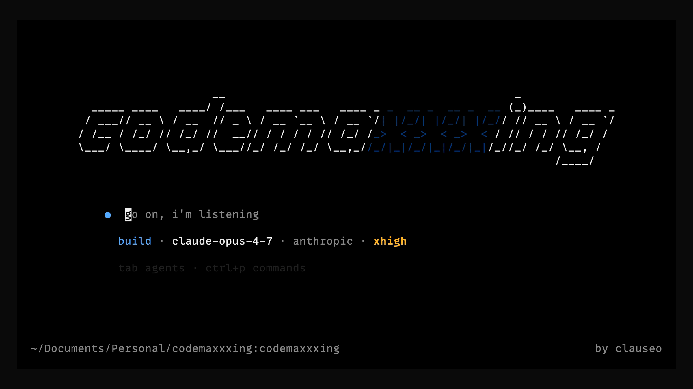 codemaxxxing home screen — the wordmark, the spinner, a session in flight